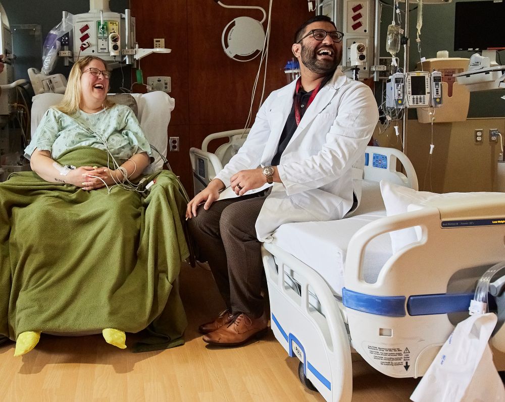 Two  doctors offering support to a patient or loved one